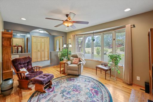 Light filled living room with hardwood floors.