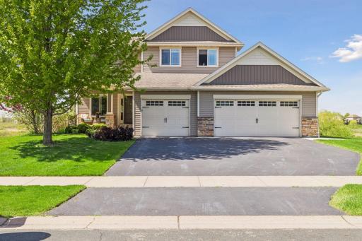 Front of house. 4 car garage