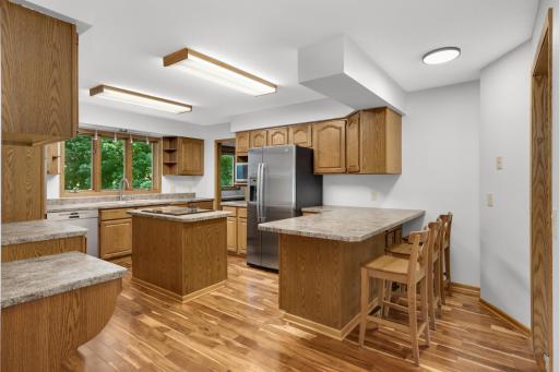 Kitchen with new fridge and built in over
