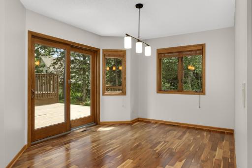 Dining room and slider to huge deck.