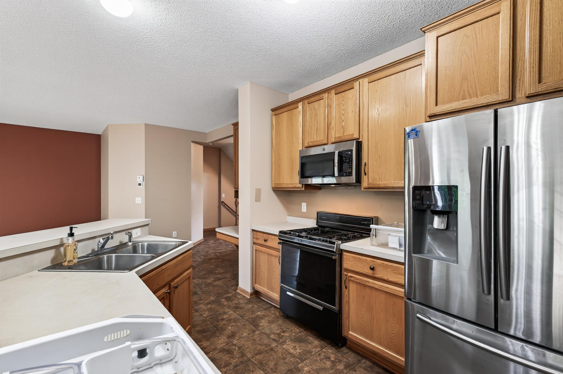 Kitchen with ample storage and oak cabinets