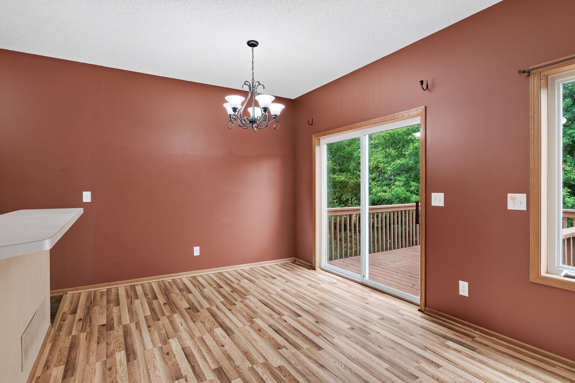 Dining area that walks out to deck and private backyard green space