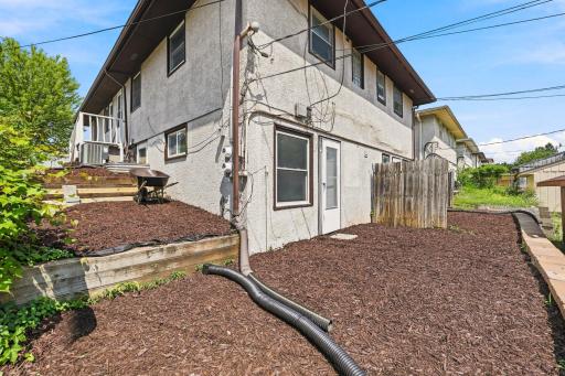 3 Entrances per side- 518 has a 2nd Kitchen in LL Each side has a side and LL walkout & private patio!