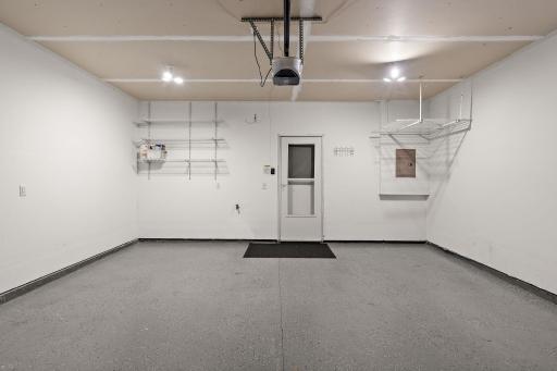 Insulated garage with epoxy floor & storage shevles