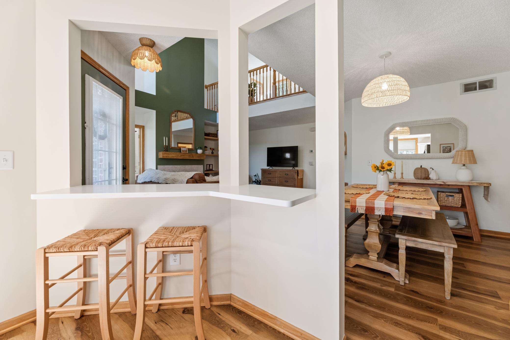 Breakfast bar adds casual seating while keeping the kitchen connected to the main living spaces.