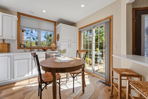 Sun-filled dining nook with direct access to the patioâperfect for indoor-outdoor living.