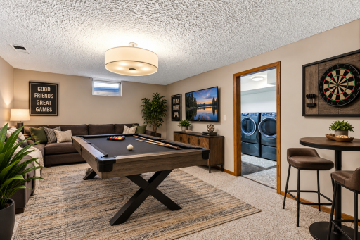 Cozy Lower Level Game Room Retreat (Virtually Staged)