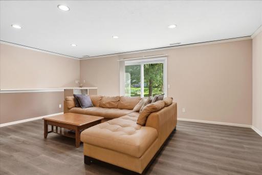 Sliding glass doors providing natural light and direct backyard access.