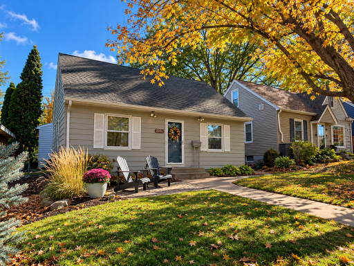 Charming St. Louis Park home featuring beautiful fall colors, mature trees and an inviting front patio