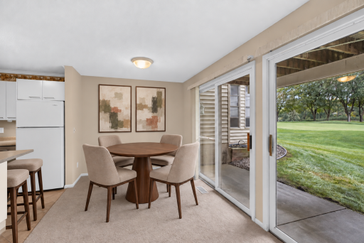 Dining area conveniently located between the kitchen and living room. Digitally Staged