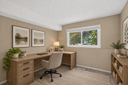 Versatile second bedroom offers plenty of space for guests or a home office. Digitally Staged