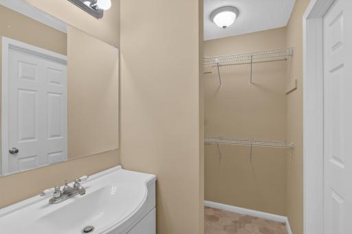 Private quarter bath conveniently located within the primary suite.