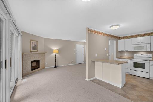 Open concept one level living with nature and gold course views.