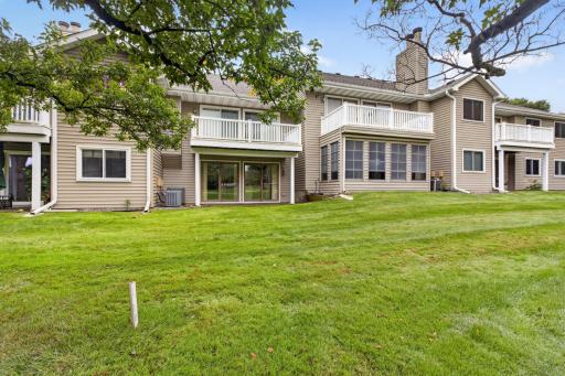 Relax and enjoy the open green space and golf course setting just beyond the patio.