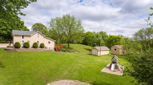 County Beauty nestled on just over 2 acres of wooded privacy yet still close enough to all of the conveniences of town.