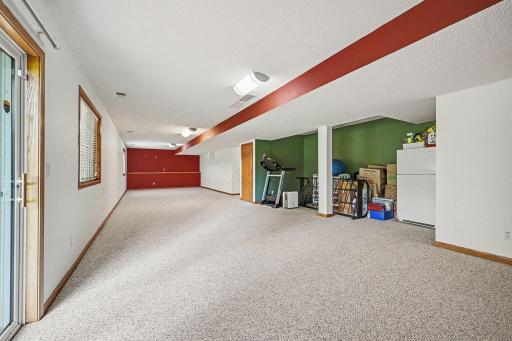Large walkout basement, recessed work out area with refrigerator,