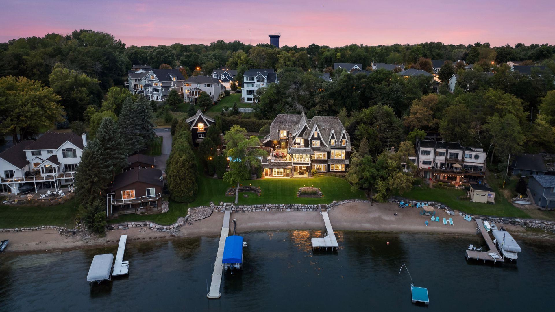 Lakefront exterior with private beach and two docks
