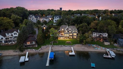 Lakefront exterior with private beach and two docks