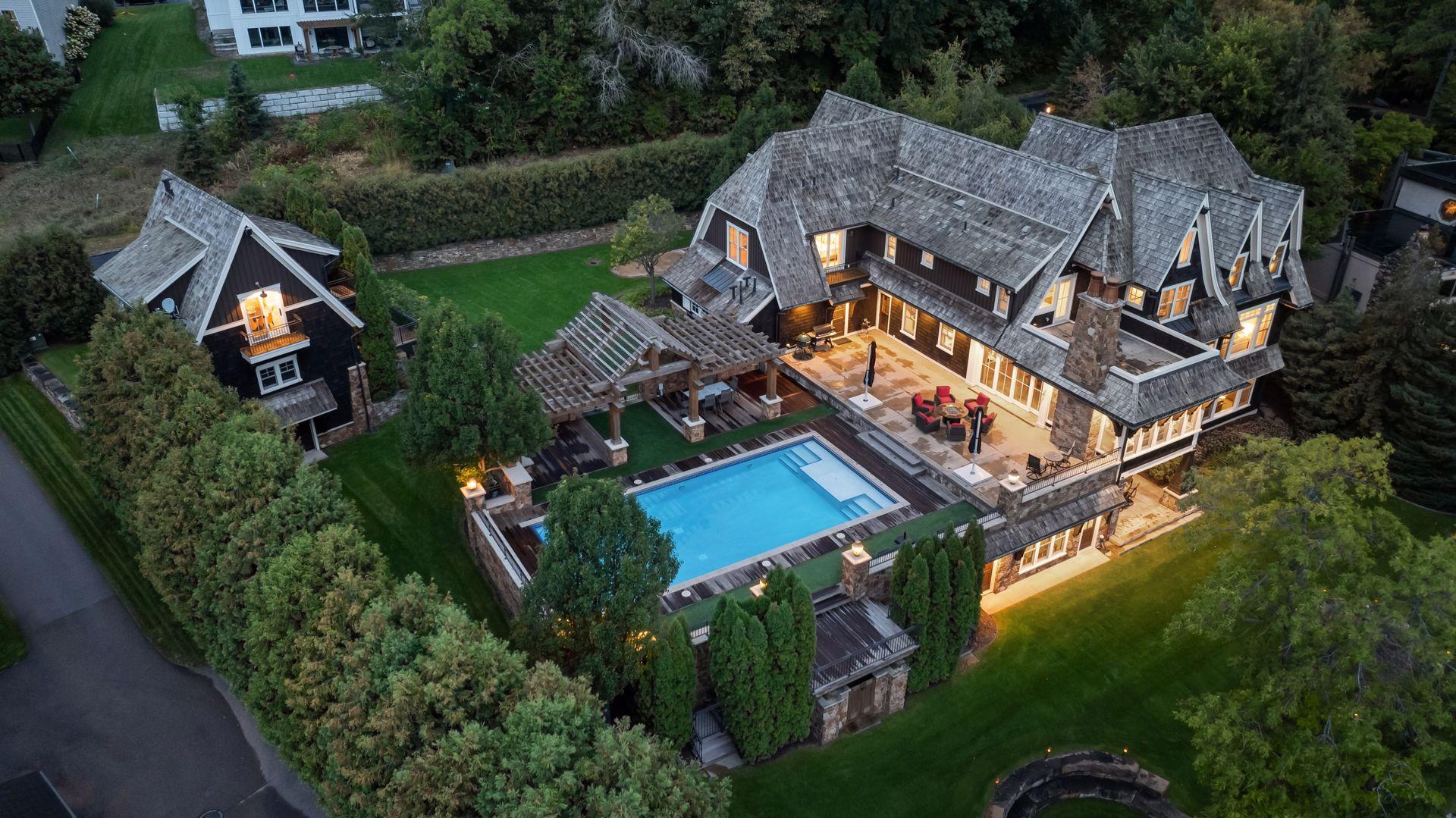 Elevated view of the pool, pergola and outdoor living areas