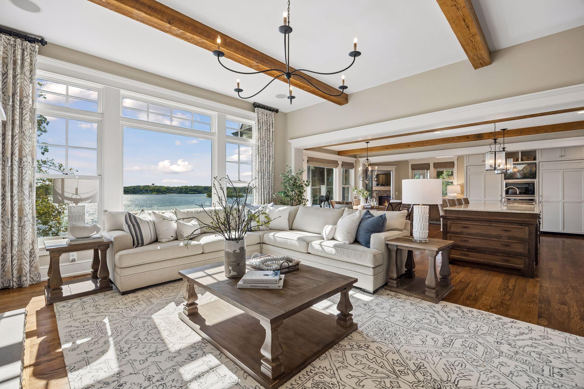 Sun-filled living room with expansive lake views