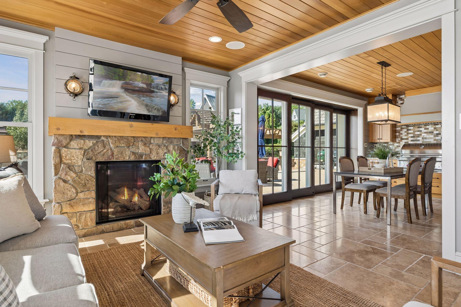 Sunroom with teak ceiling + indoor/outdoor connection