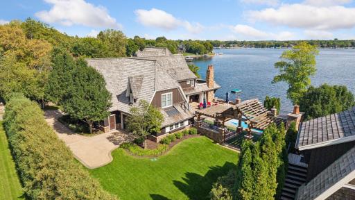 Aerial view showcasing outdoor living and lake views