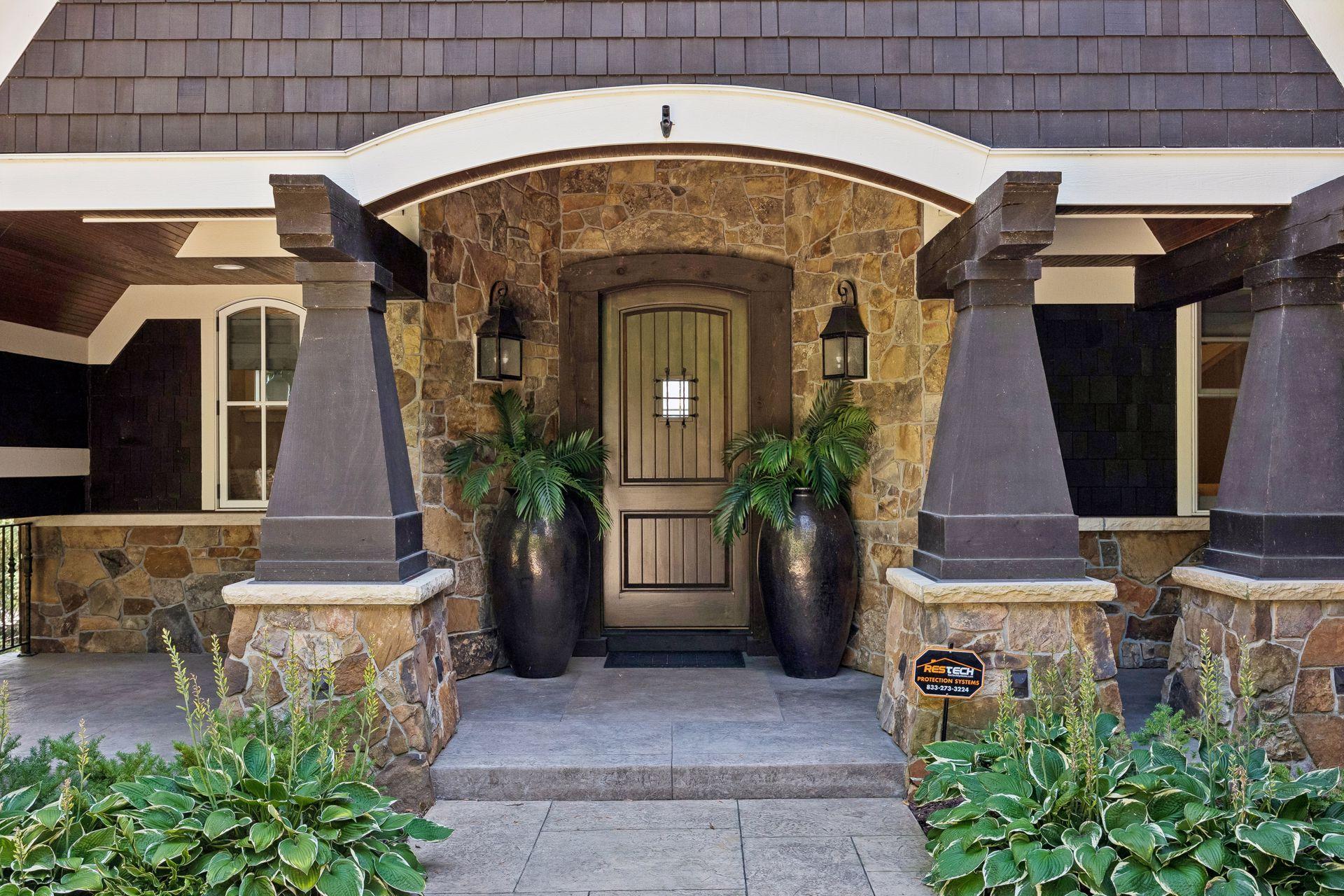 Covered front entry with stone detailing