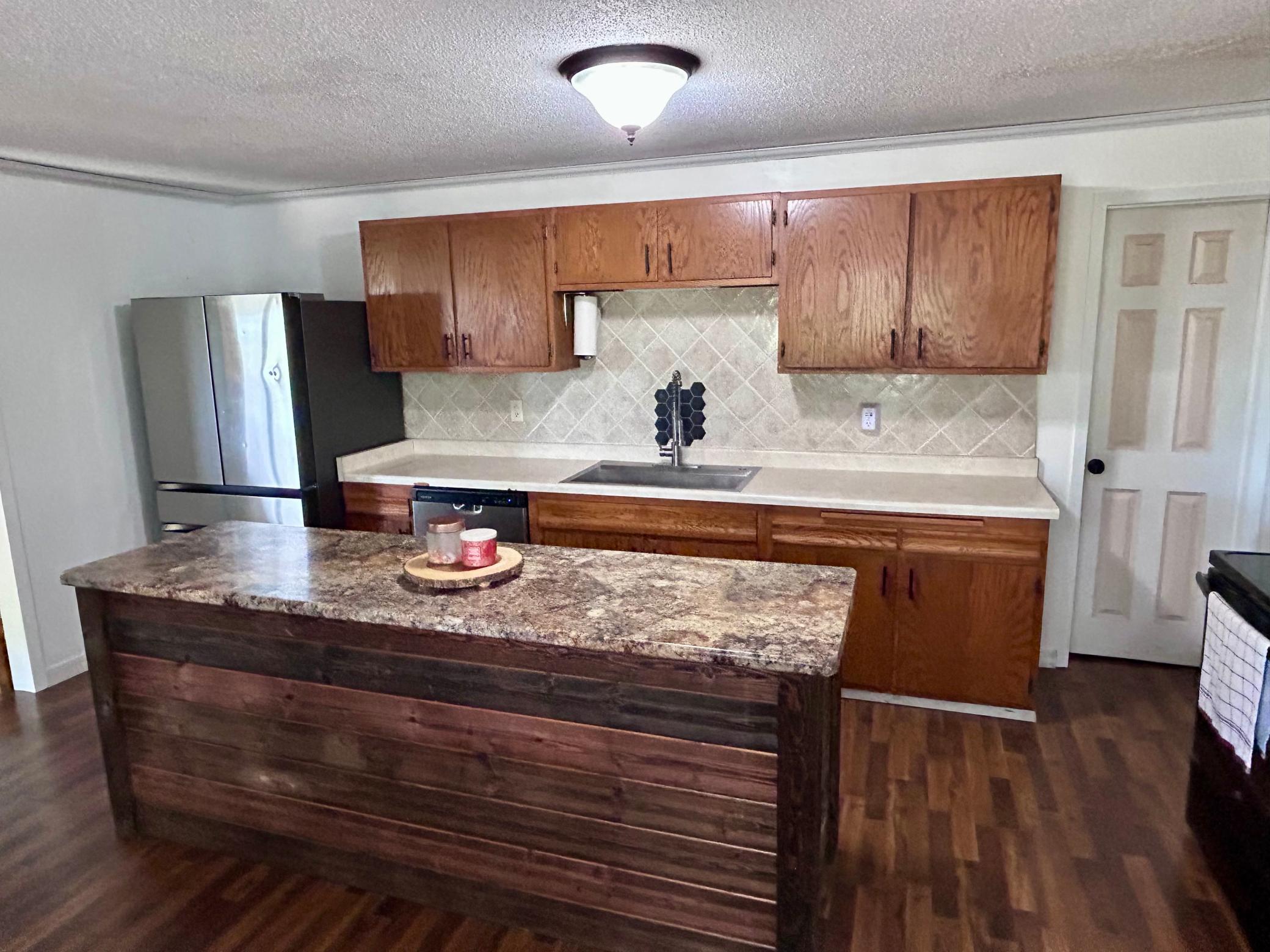 Large open layout kitchen with Stainless Steel Appliances