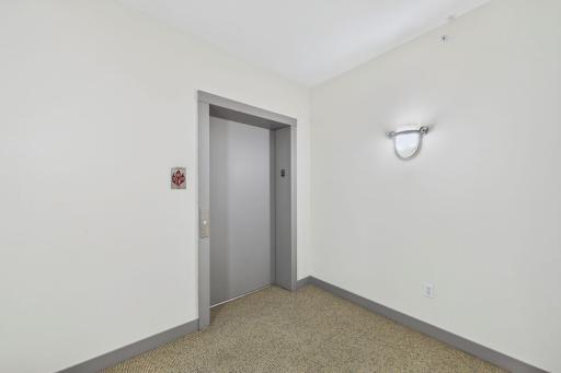 Elevator to garage and within short steps of the back entrance to the condo