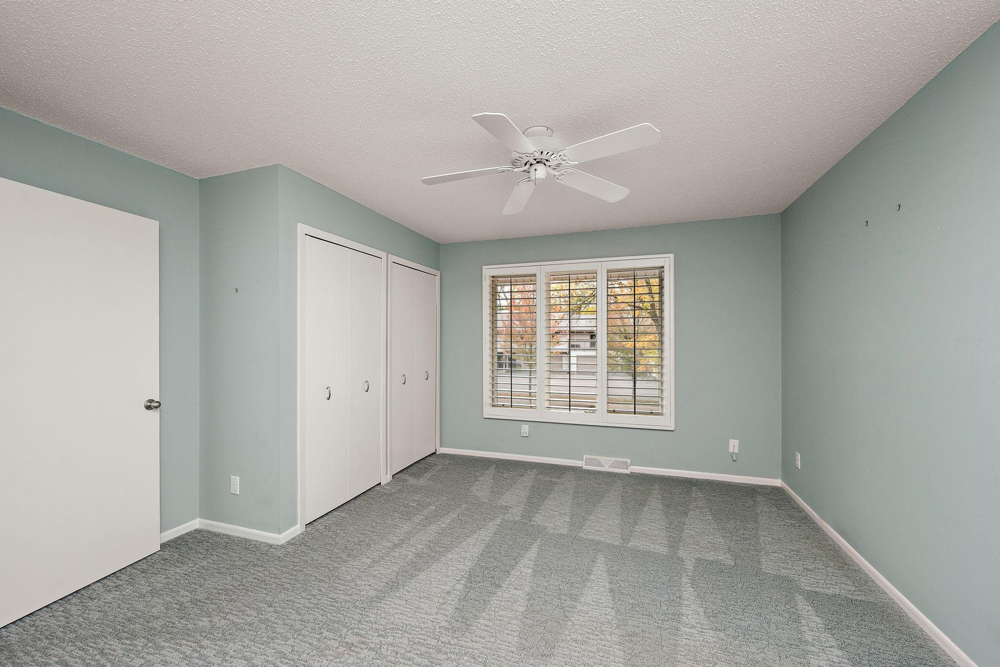Owners bedroom includes double closet and pass through to full bathroom