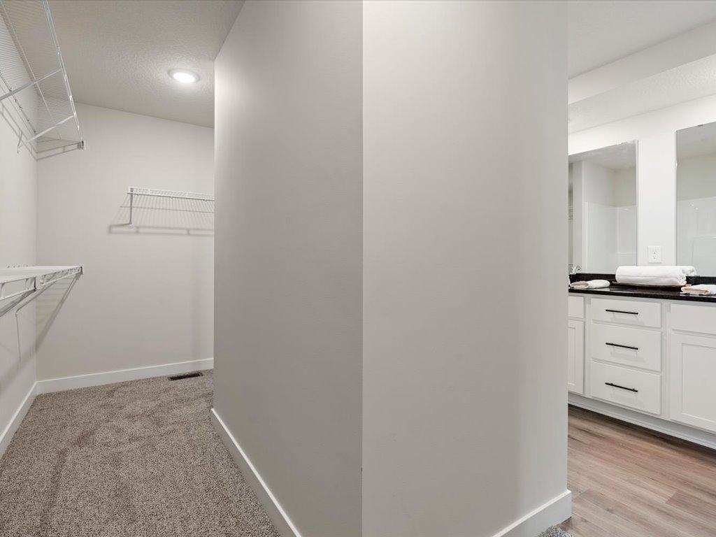 Wrap around walk in closet