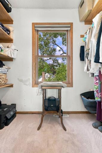 Primary bedroom walk in closet 2
