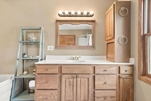 Upper floor bathroom w/ soaking tub and shower