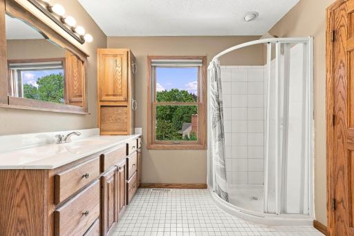 Upper floor bathroom w/ soaking tub and shower