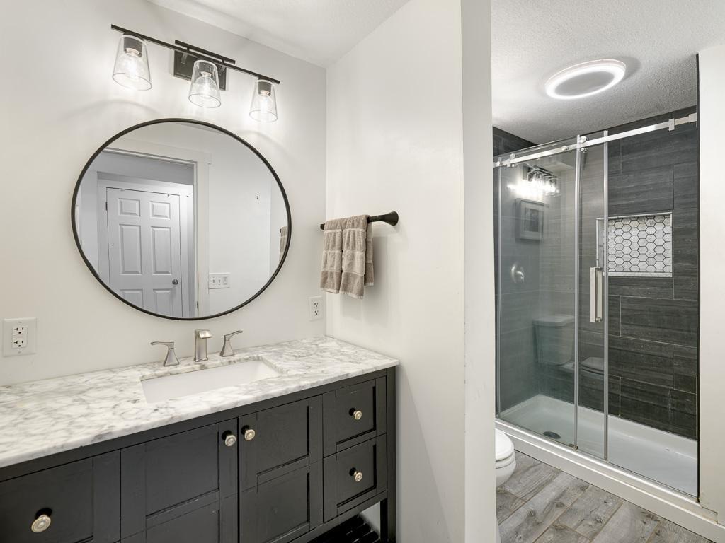 No more cold feet in your updated lower level bathroom with heated floors!