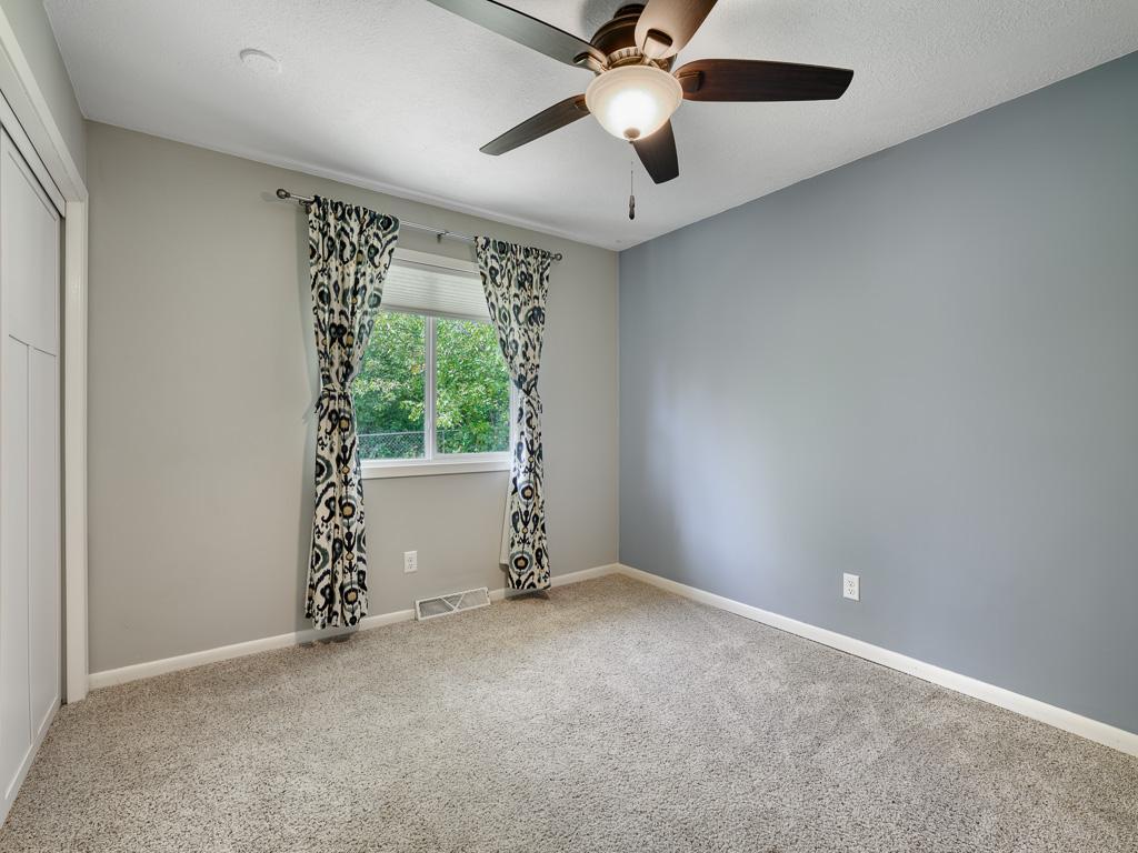 The second upper bedroom also features good closet space.