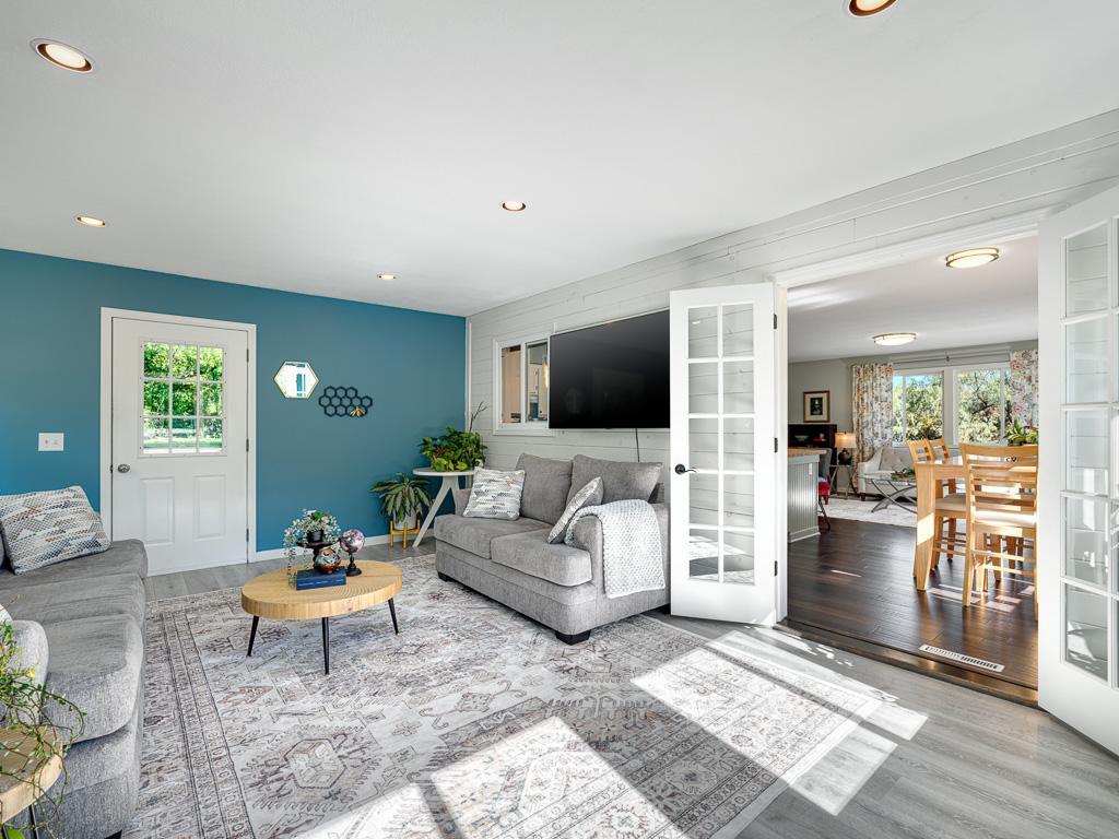 Bask in the sun with your favorite book in your expansive sunroom.