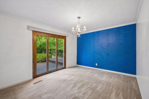 Dining room with doors out to backyard patio