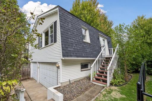 3 car garage includes unfinished room above - tons of potential