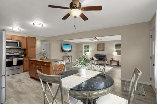 Open flow from the Kitchen and Dining into the Extra-large Living Room. Updated LVP flooring throughout.