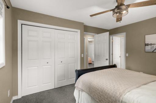 This bedroom walks through to the main bathroom.