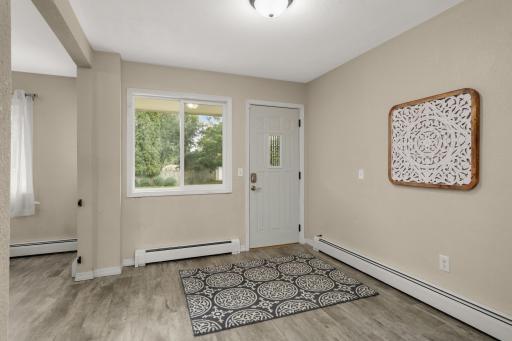 This large entry offers much more than a place to come and go - use it as a Mudroom, drop zone or multi-purpose space.