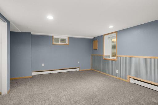 Lower-level 4th Bedroom is great for guests, teens or a private home office.
