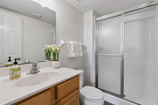 Conveniently located alongside the lower-level bedroom and family room, this updated Â¾ bath adds another layer of flexibility to the finished lower level.