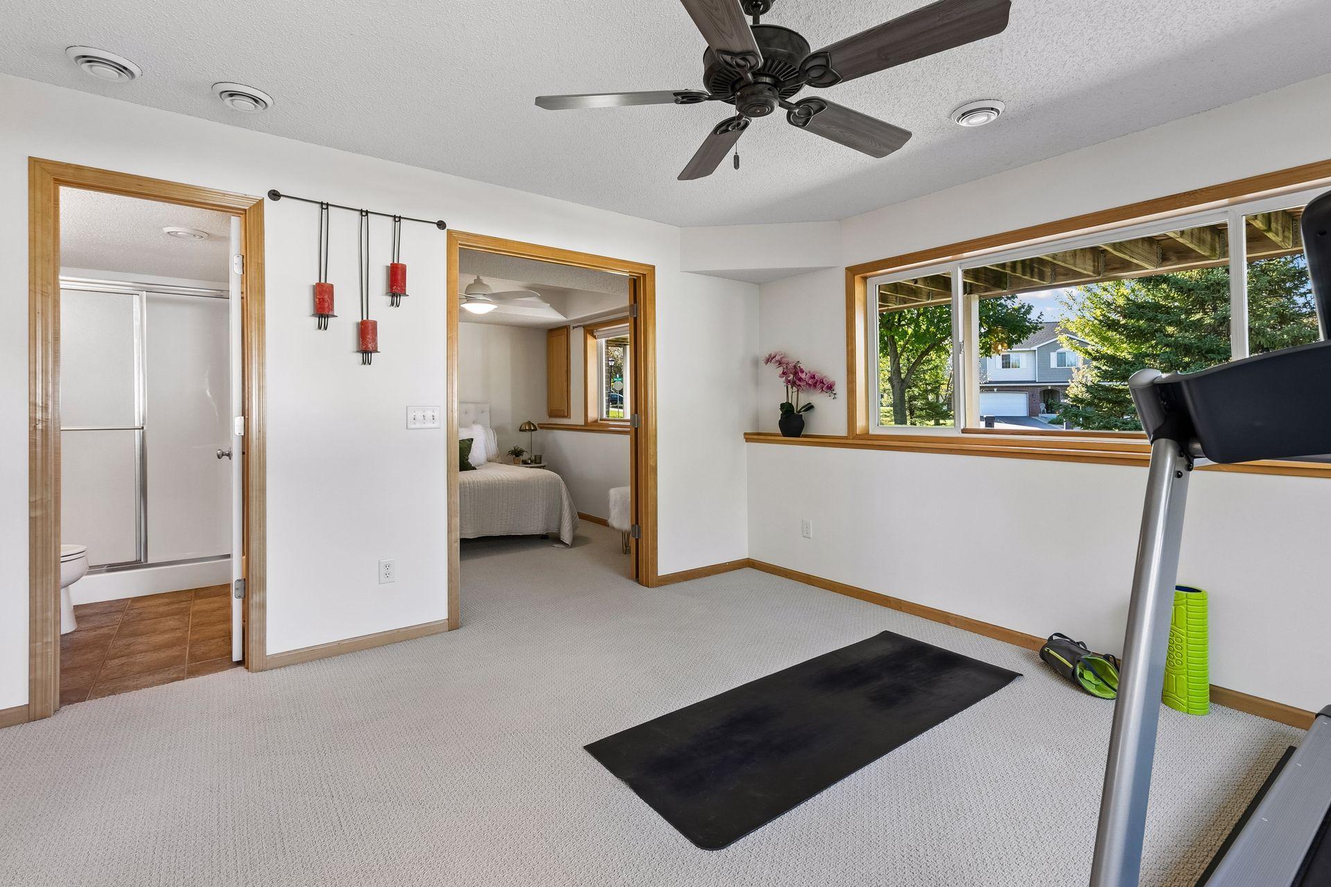 The family room sits at the heart of this flexible lower level, with easy connections to the third bedroom and ¾ bath creating a space that can adapt beautifully to guests, recreation or extended living.