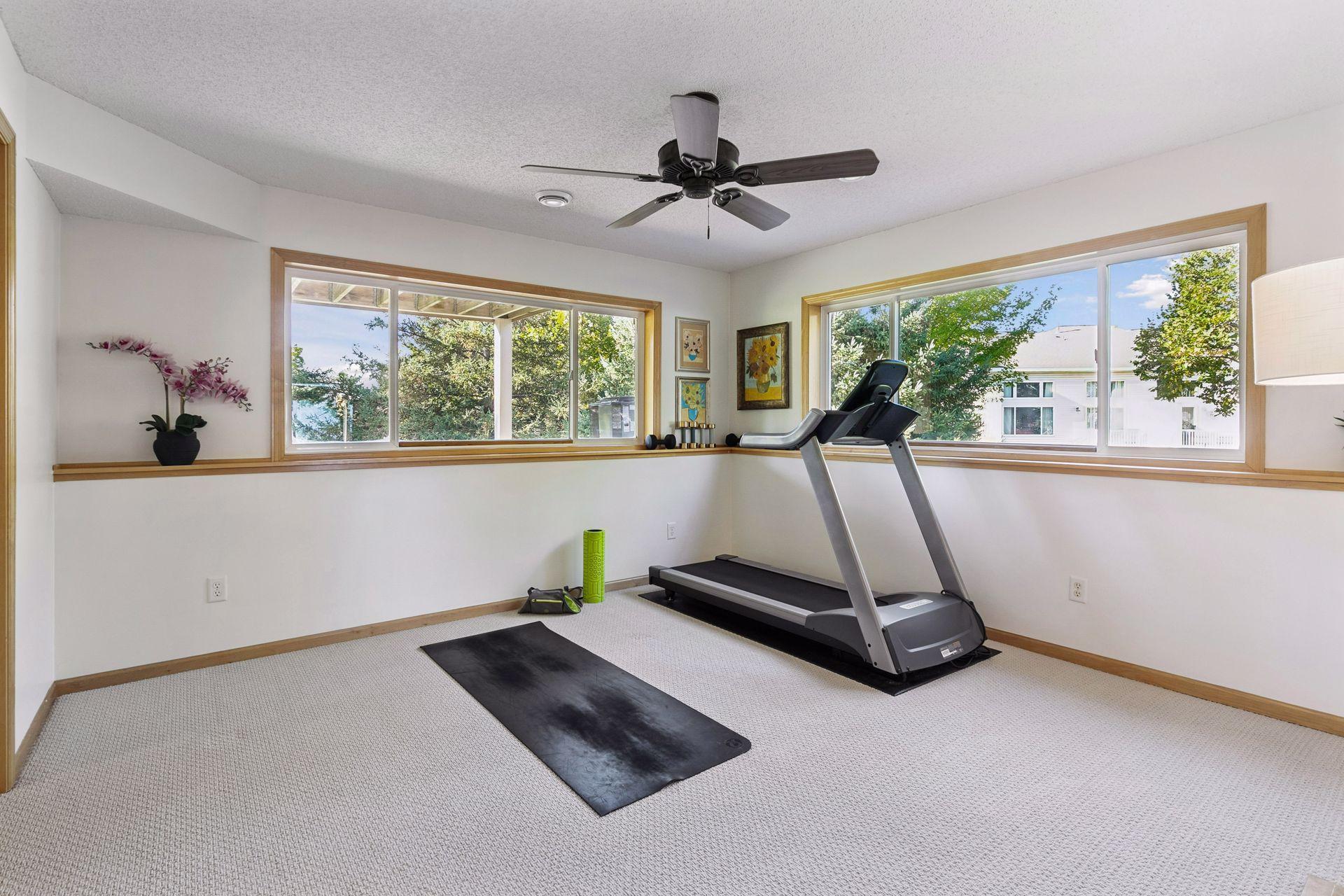Lookout windows on two walls fill the lower-level family room with natural light, creating a comfortable space that feels far removed from the typical basement.