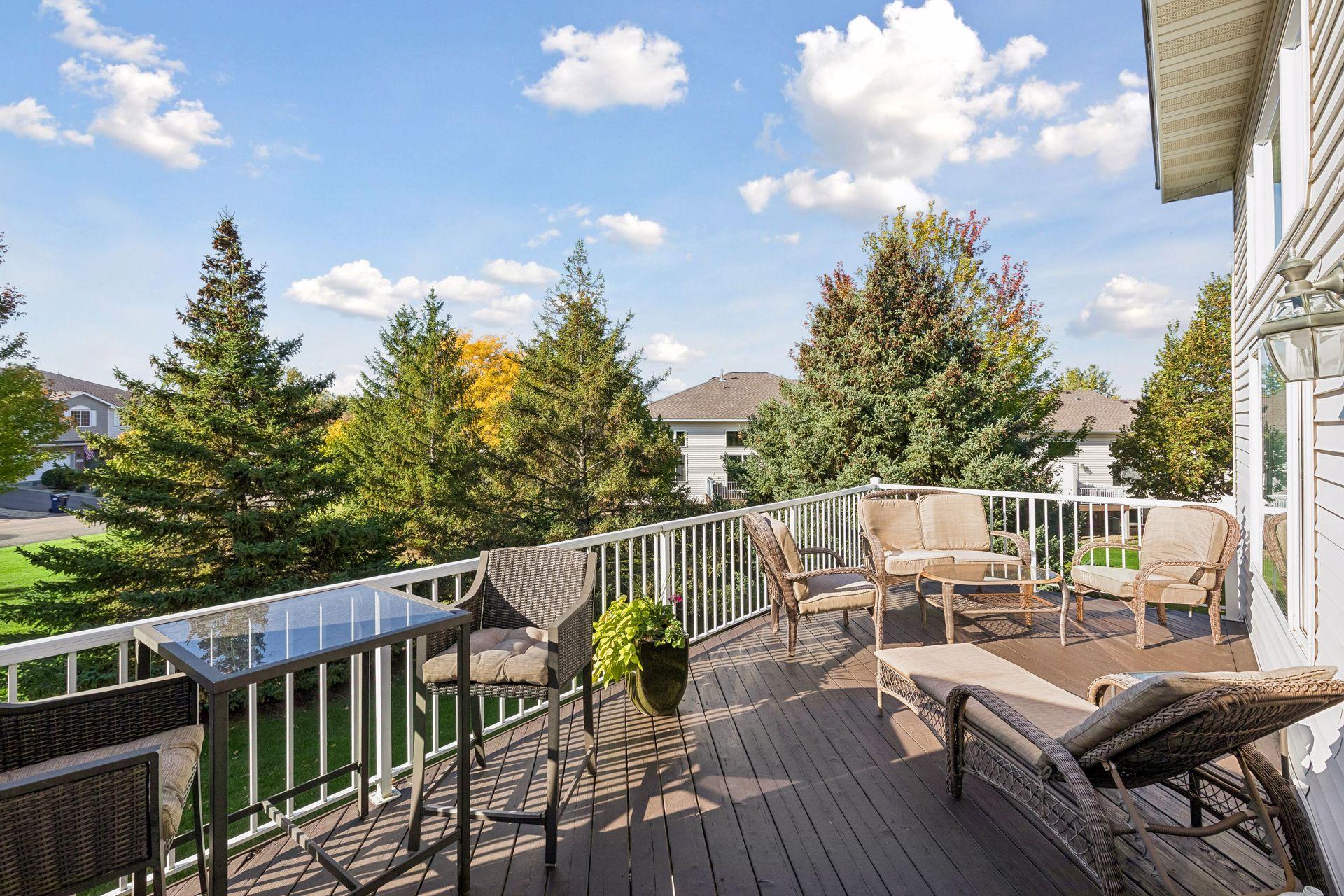 Oversized for the complex, the deck extends the living space outdoors with plenty of room for dining, relaxing and enjoying the surrounding setting.