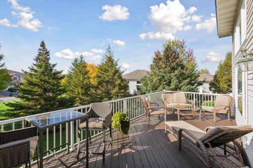 Oversized for the complex, the deck extends the living space outdoors with plenty of room for dining, relaxing and enjoying the surrounding setting.