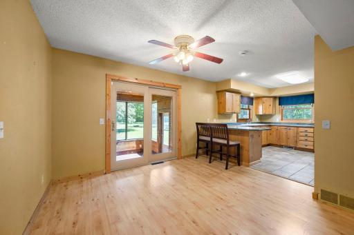 Dining area and doors leading to the three season porch