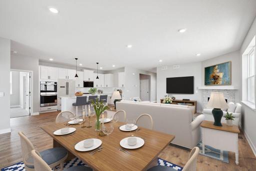 Open main level with laminate flooring throughout provides a great space for any type of gatherings. *Picture is of actual home.